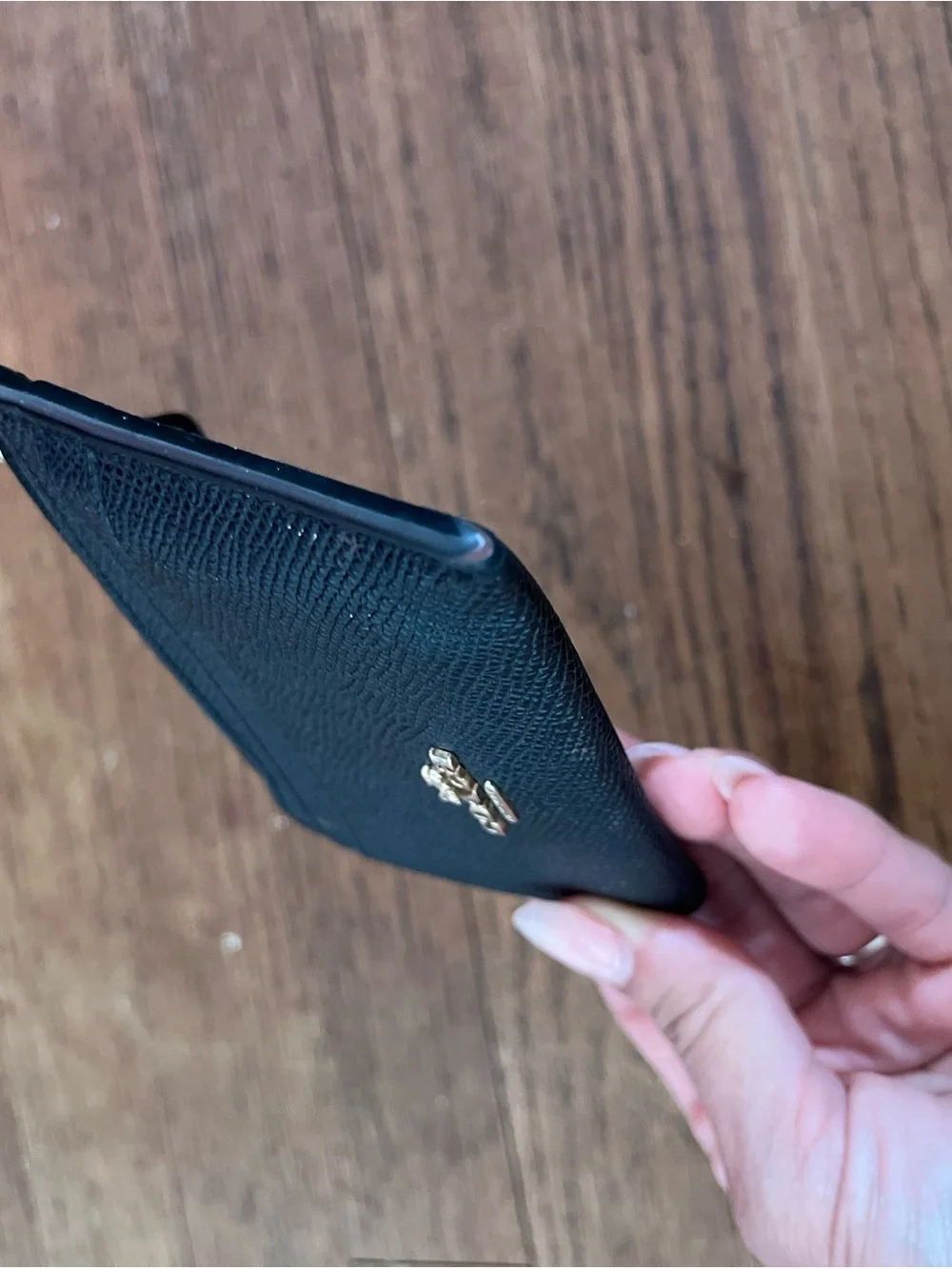 COACH Black Pebbled Leather Zip Card Wallet with Gold Logo